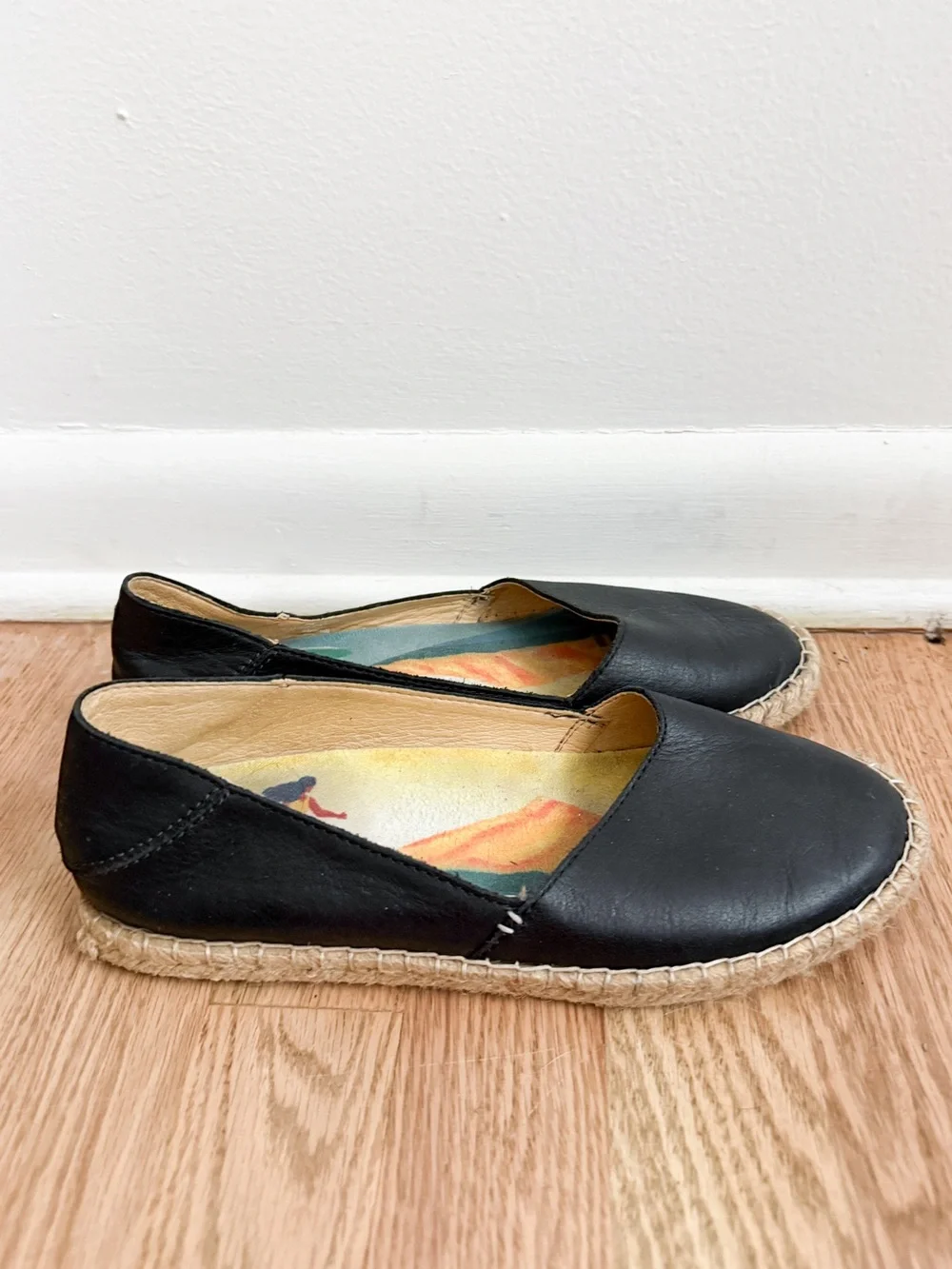 OluKai Kaula Pa'A 'Ili black leather slip-on espadrille flats